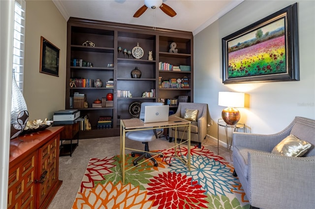 office with ornamental molding, carpet flooring, ceiling fan, and baseboards