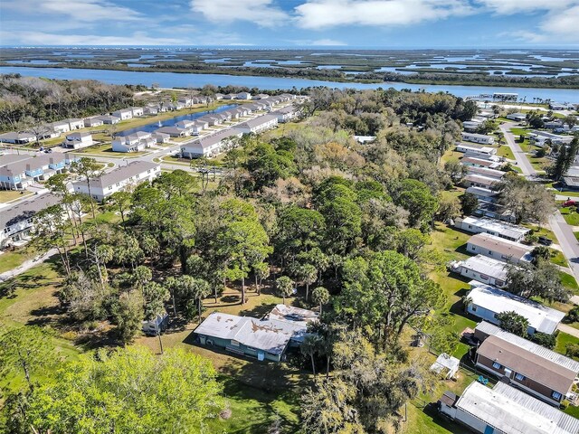 bird's eye view with a water view and a residential view