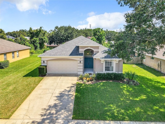 view of front of home with a front lawn, roof with shingles, stucco siding, driveway, and an attached garage