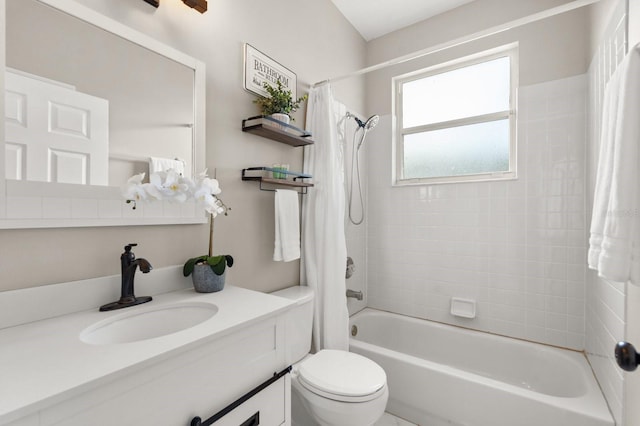 full bath featuring toilet, shower / bath combination with curtain, and vanity