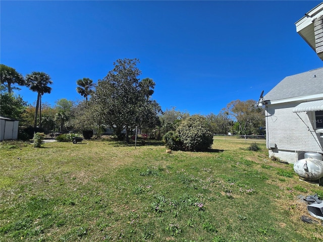 view of yard with fence