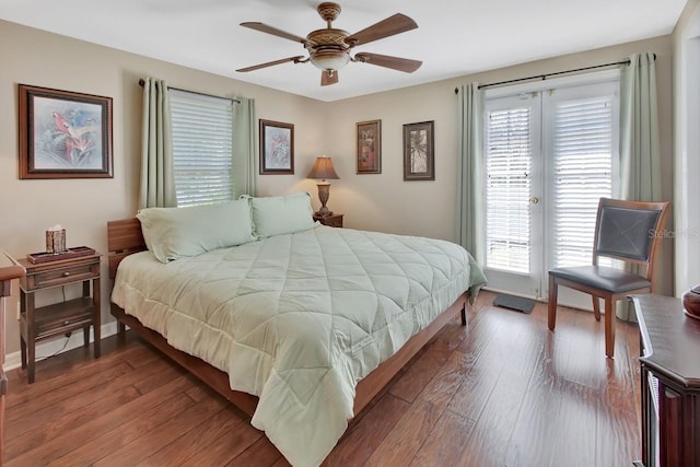 bedroom featuring access to outside, baseboards, ceiling fan, and hardwood / wood-style floors