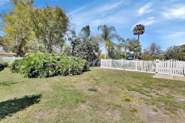 view of yard featuring fence