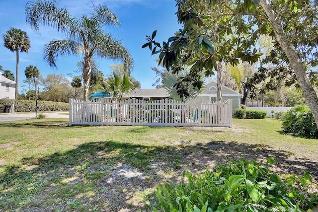 view of yard with fence