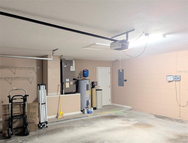 garage with electric panel, electric water heater, heating unit, a garage door opener, and concrete block wall
