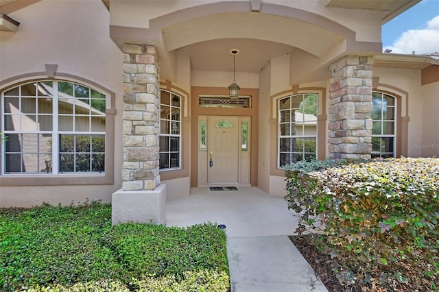 1491 W Silver Hammock, Deland, FL 32720 - entrance to property featuring stone siding and stucco siding