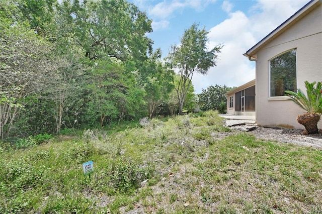1491 W Silver Hammock, Deland, FL 32720 - view of yard featuring a sunroom