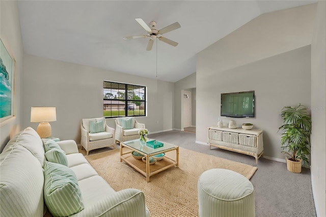 carpeted living room with lofted ceiling, baseboards, and ceiling fan