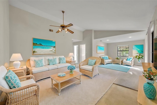 living room featuring vaulted ceiling and visible vents