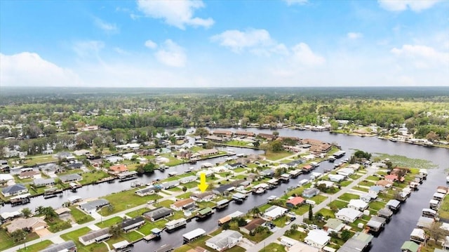 birds eye view of property with a residential view and a water view