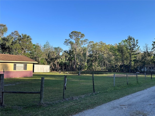 view of yard featuring fence