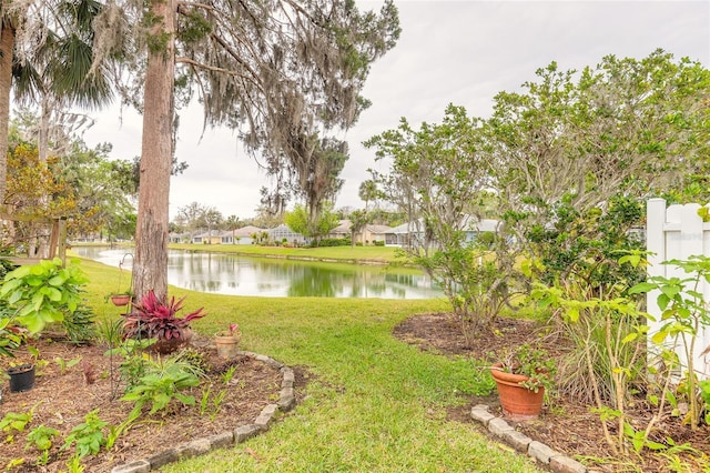 view of yard with a water view