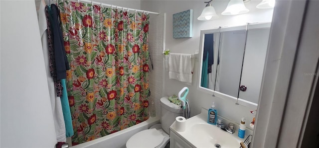 bathroom with vanity, toilet, and shower / bathtub combination with curtain