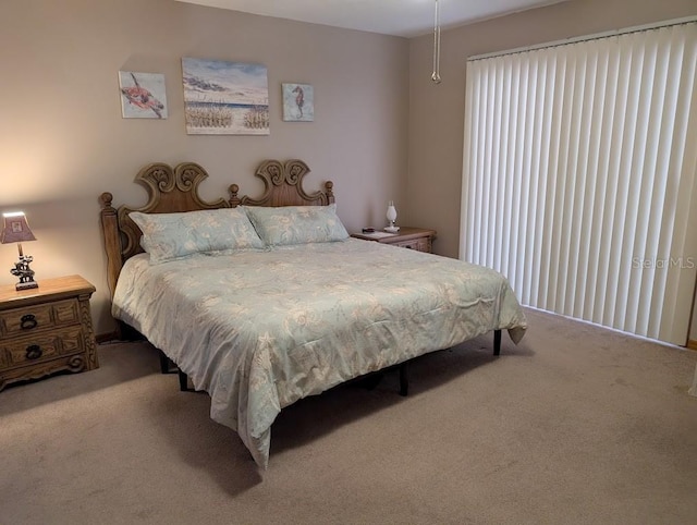 bedroom featuring carpet