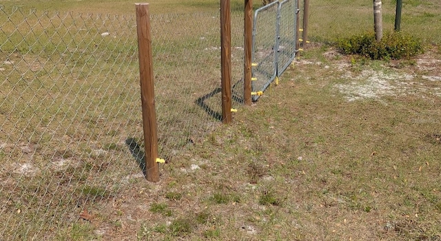 exterior space with fence and a gate