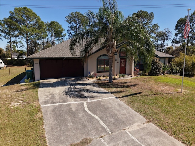 view of front of house featuring concrete driveway, roof with shingles, an attached garage, a front lawn, and stucco siding