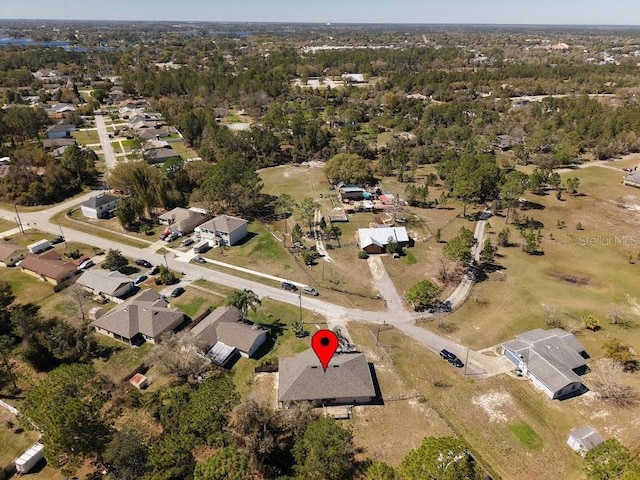 drone / aerial view with a residential view