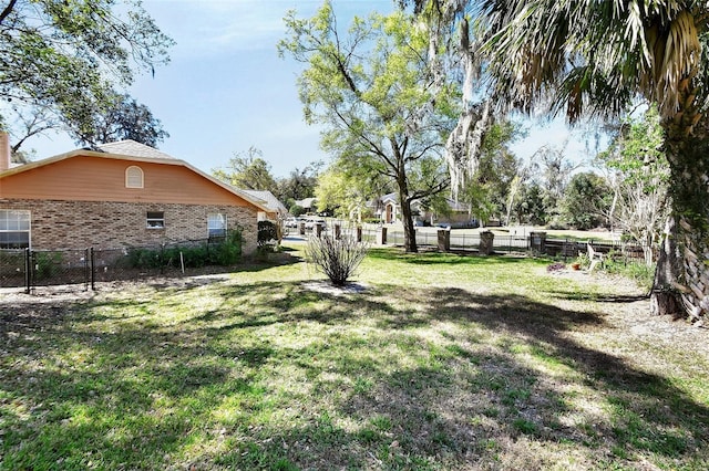 view of yard featuring fence