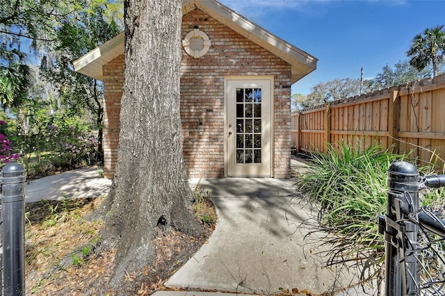 view of outdoor structure with fence