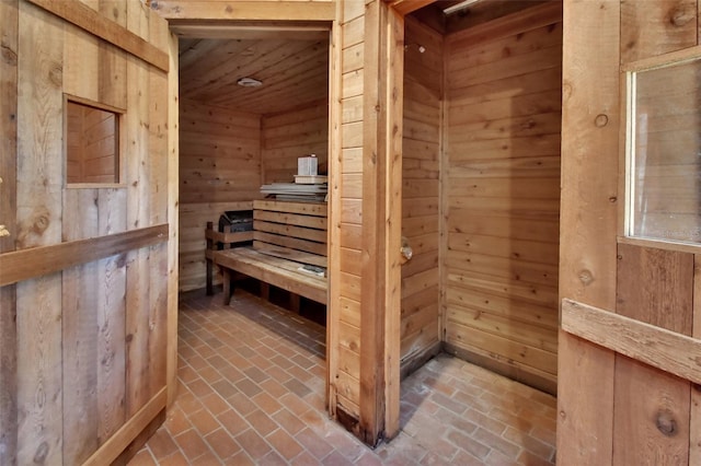 view of sauna / steam room with brick floor