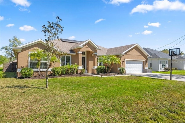 ranch-style house featuring concrete driveway, a front yard, roof mounted solar panels, stucco siding, and a garage