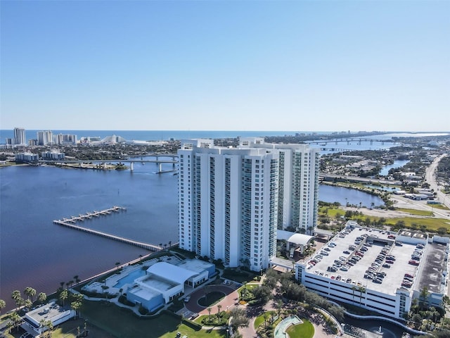 bird's eye view featuring a water view and a view of city