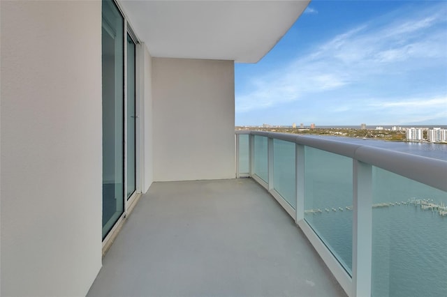 balcony featuring a water view