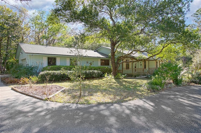 ranch-style home featuring an attached garage