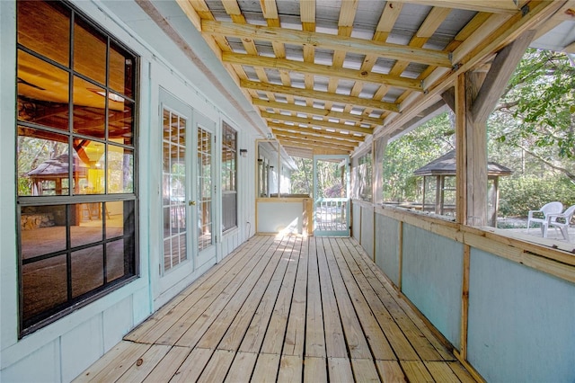 wooden deck featuring french doors