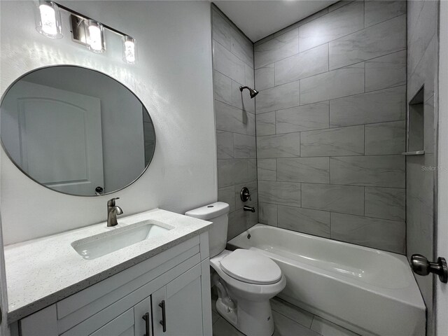 full bath with washtub / shower combination, toilet, and vanity