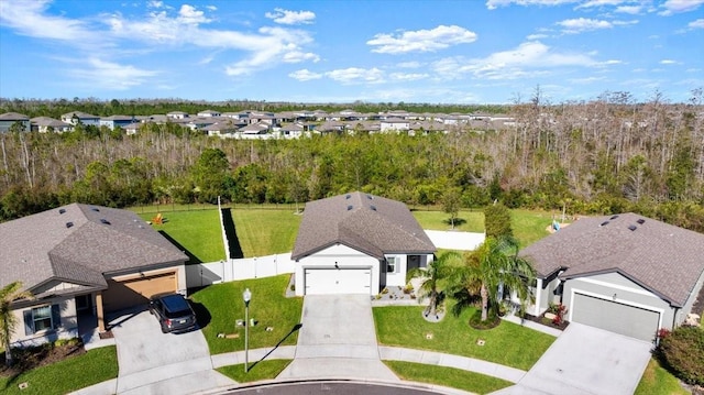 birds eye view of property with a residential view