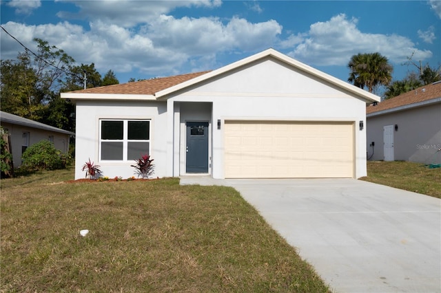 single story home with concrete driveway, an attached garage, a front yard, and stucco siding