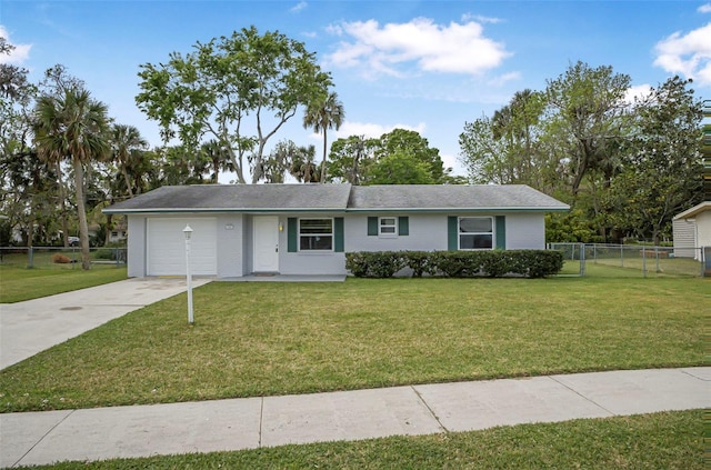 ranch-style home with brick siding, a front lawn, fence, concrete driveway, and a garage