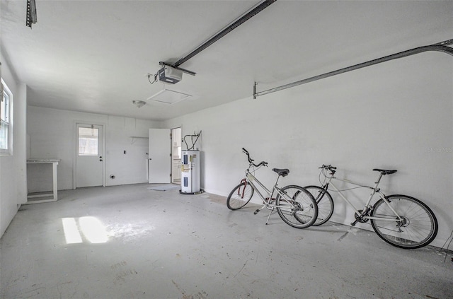 1986 Big Oak Dr, South Daytona, FL 32119 - garage featuring a garage door opener and water heater