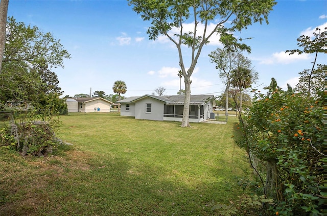 1986 Big Oak Dr, South Daytona, FL 32119 - view of yard featuring fence and a sunroom