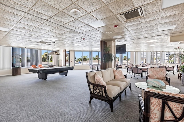 recreation room featuring a paneled ceiling, carpet floors, and visible vents