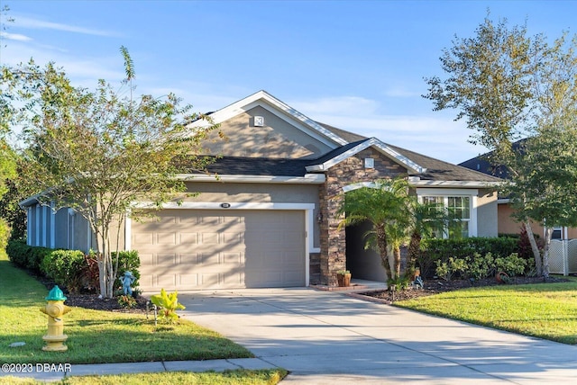 view of front of property featuring stucco siding, a front lawn, stone siding, concrete driveway, and a garage