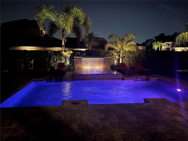 view of pool featuring a fenced in pool, a patio, and fence