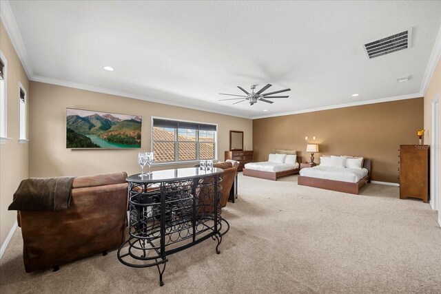 living room with baseboards, visible vents, ceiling fan, crown molding, and carpet flooring