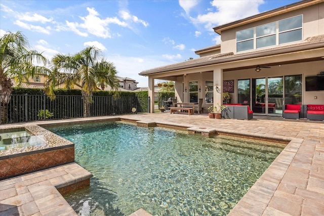 view of pool with a ceiling fan, a patio area, fence, and a fenced in pool