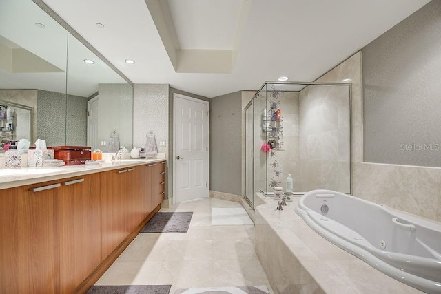 full bath featuring recessed lighting, vanity, a jetted tub, and a shower stall