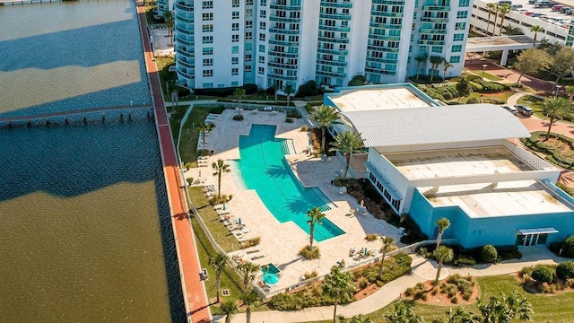 birds eye view of property with a water view