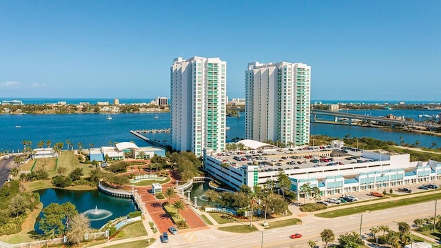 aerial view featuring a water view and a city view