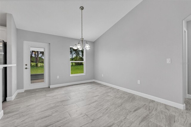 1329 N Old Mill Dr, Deltona, FL 32725 - unfurnished room featuring baseboards, an inviting chandelier, and vaulted ceiling