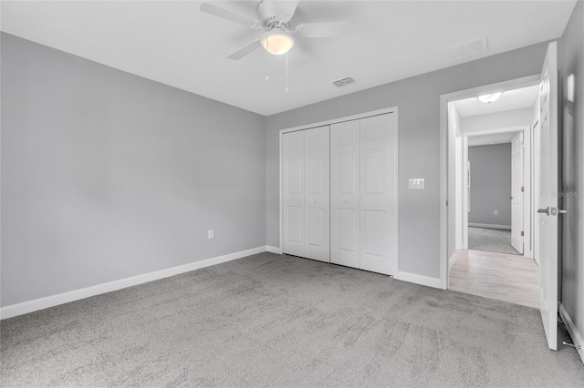 1329 N Old Mill Dr, Deltona, FL 32725 - unfurnished bedroom with carpet flooring, baseboards, visible vents, and a closet