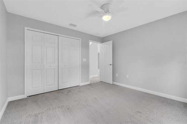 1329 N Old Mill Dr, Deltona, FL 32725 - unfurnished bedroom with carpet flooring, baseboards, visible vents, and a closet