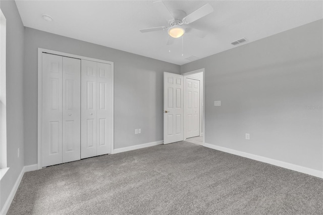 1329 N Old Mill Dr, Deltona, FL 32725 - unfurnished bedroom with a closet, visible vents, carpet flooring, and baseboards
