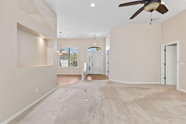 entrance foyer with recessed lighting, baseboards, carpet floors, and ceiling fan with notable chandelier