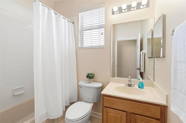 bathroom featuring shower / bath combination with curtain, toilet, and vanity