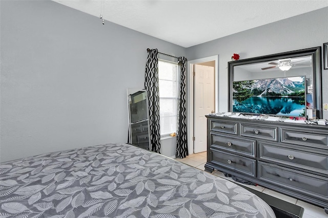 bedroom with light tile patterned floors